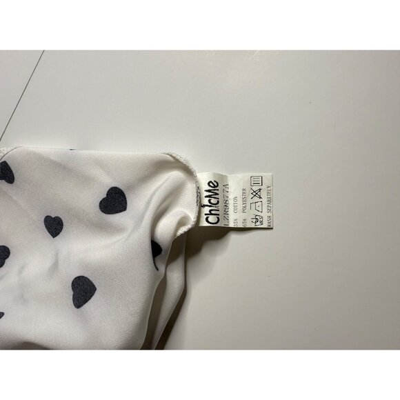 White Sleeveless Heart Print Blouse W/ Lace Details & Ruffled Shoulders - Picture 7 of 7